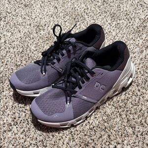 On Running Women’s Black and Purple Athletic Shoes